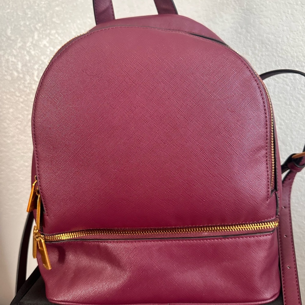 Neiman Marcus Red and Gold Backpack Sleek Design